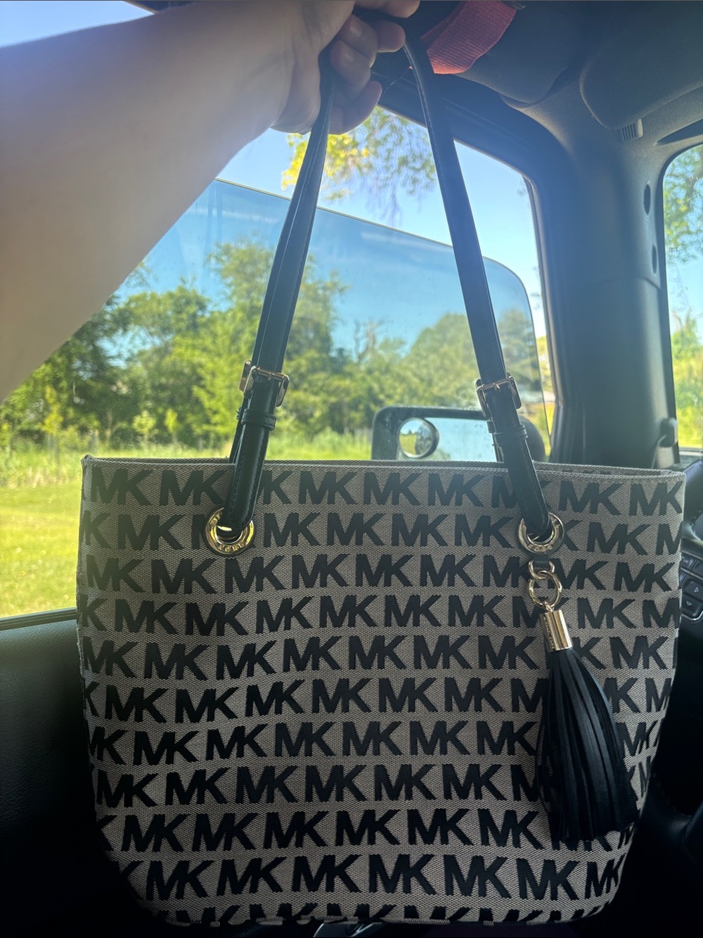 Michael Kors Black and Beige MK Logo Tote with Tassel Charm